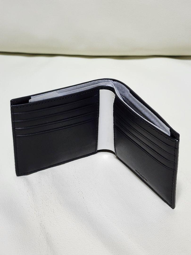 コーチ 二つ折り財布 カーイラスト ブラック 日本最級 vrrraiment.fr