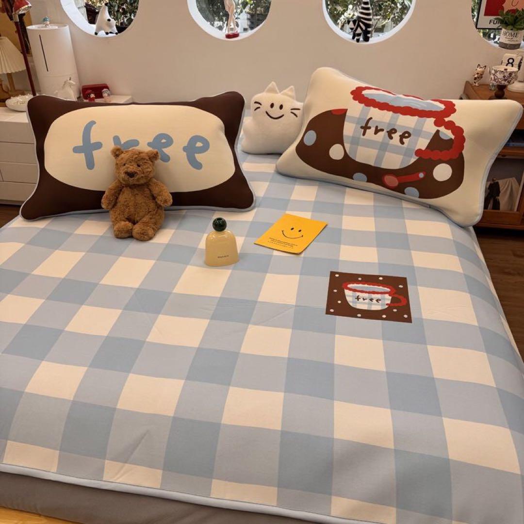 水色と白のチェック柄クッションセット