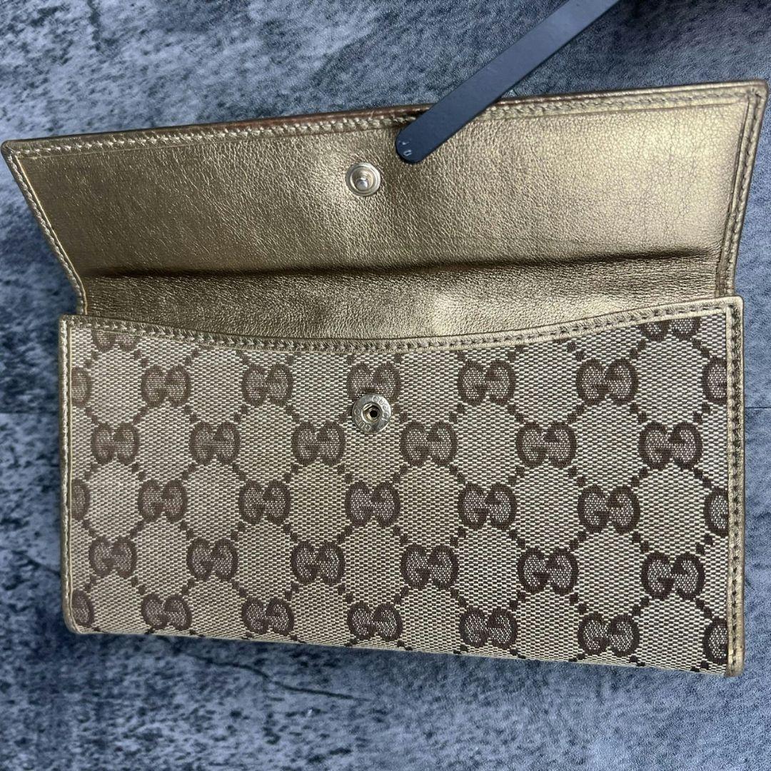 美品 GUCCI GGキャンバス×ゴールドレザー 二つ折り長財布 金具GG柄