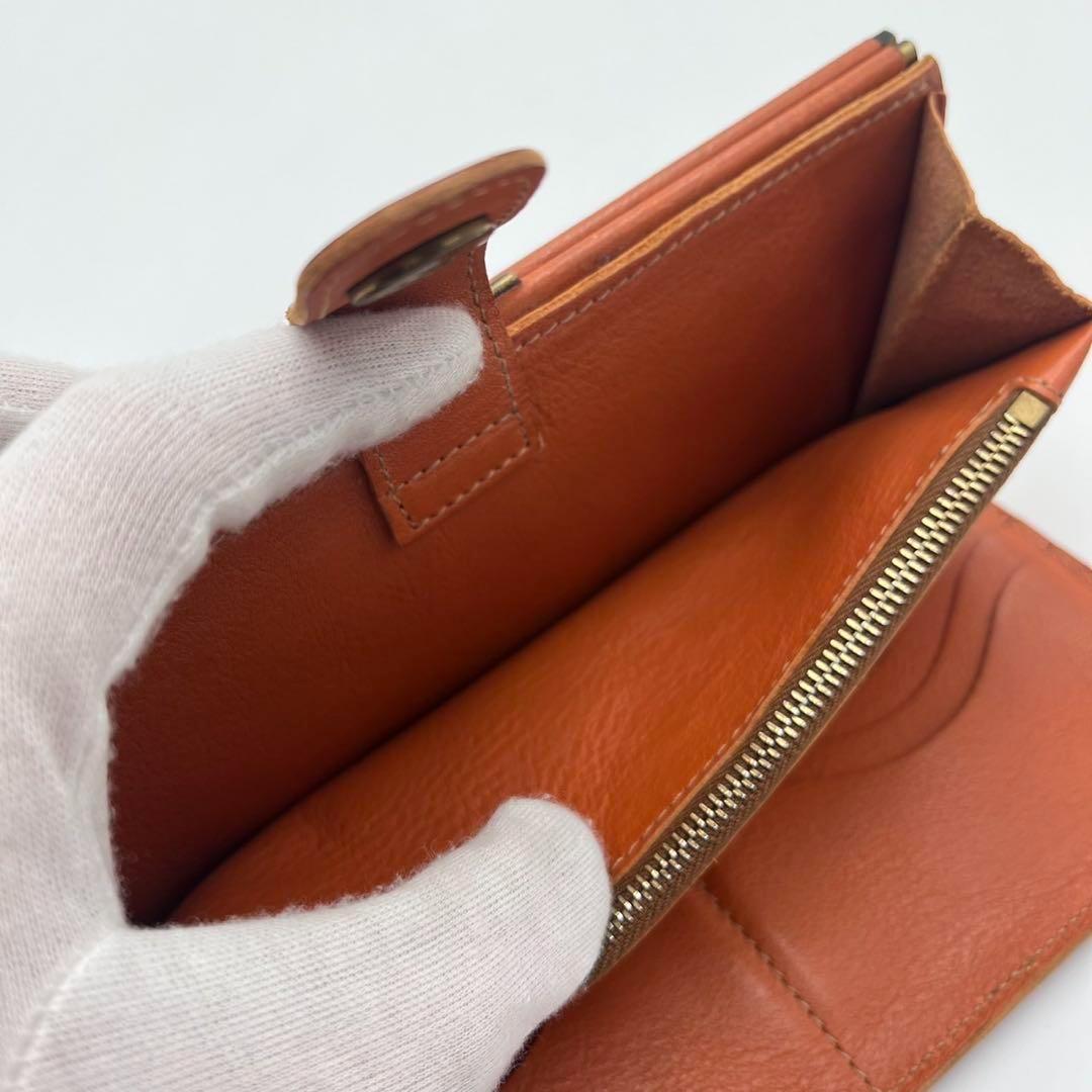 希少 極美品 イルビゾンテ 長財布 がま口 オレンジ 金ボタン