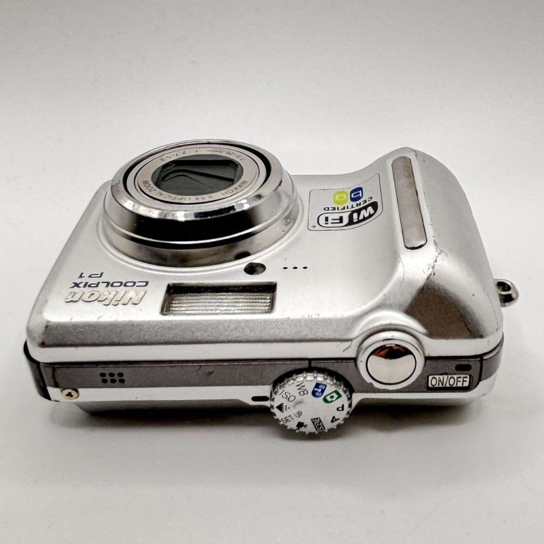 【年中無休】 Nikon メルカリ - 新品バッテリー付 シルバー P1 COOLPIX デジタルカメラ