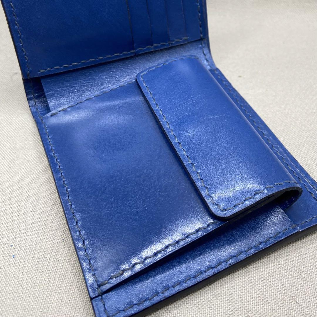 ［オーダー品］ ハンドメイド（手縫い）　牛ヌメ革（サファイヤブルー）二つ折り財布