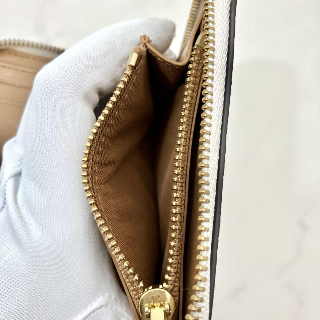 52【極美品/未使用級】COACH 二つ折り財布 ジップウォレット