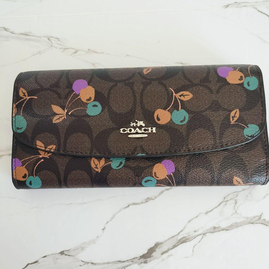 未使用品☆COACH コーチ☆二つ折り長財布 シグネチャーブラウン×チェリー