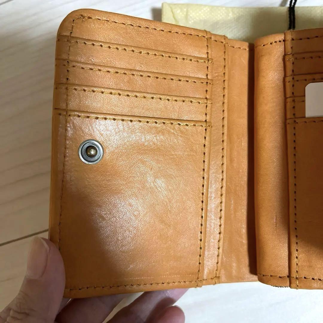 ズッケロフィラート牛革三つ折り財布 ブラウン 48984