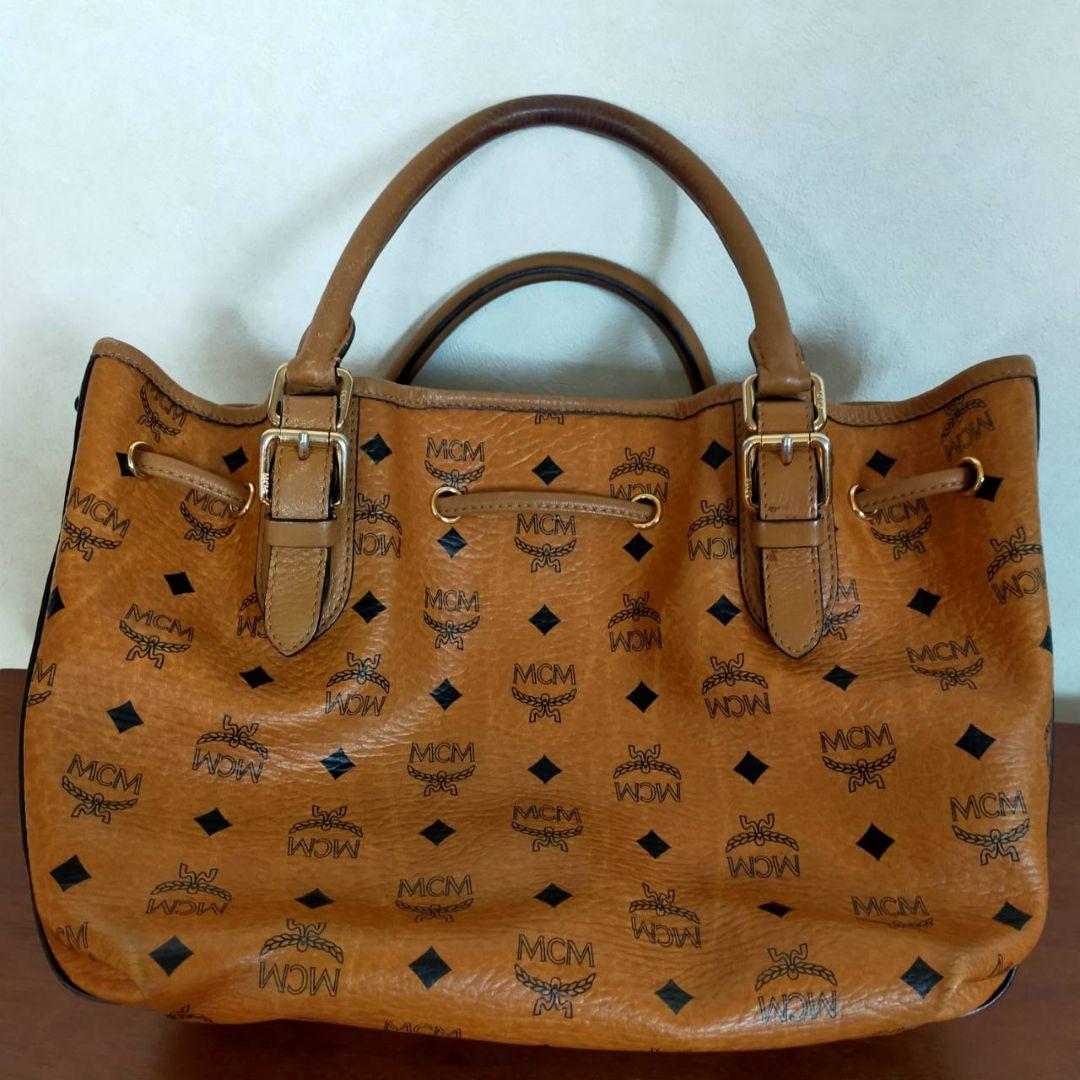 MCM ロゴプリント ハンドバッグ ブラウン - メルカリ