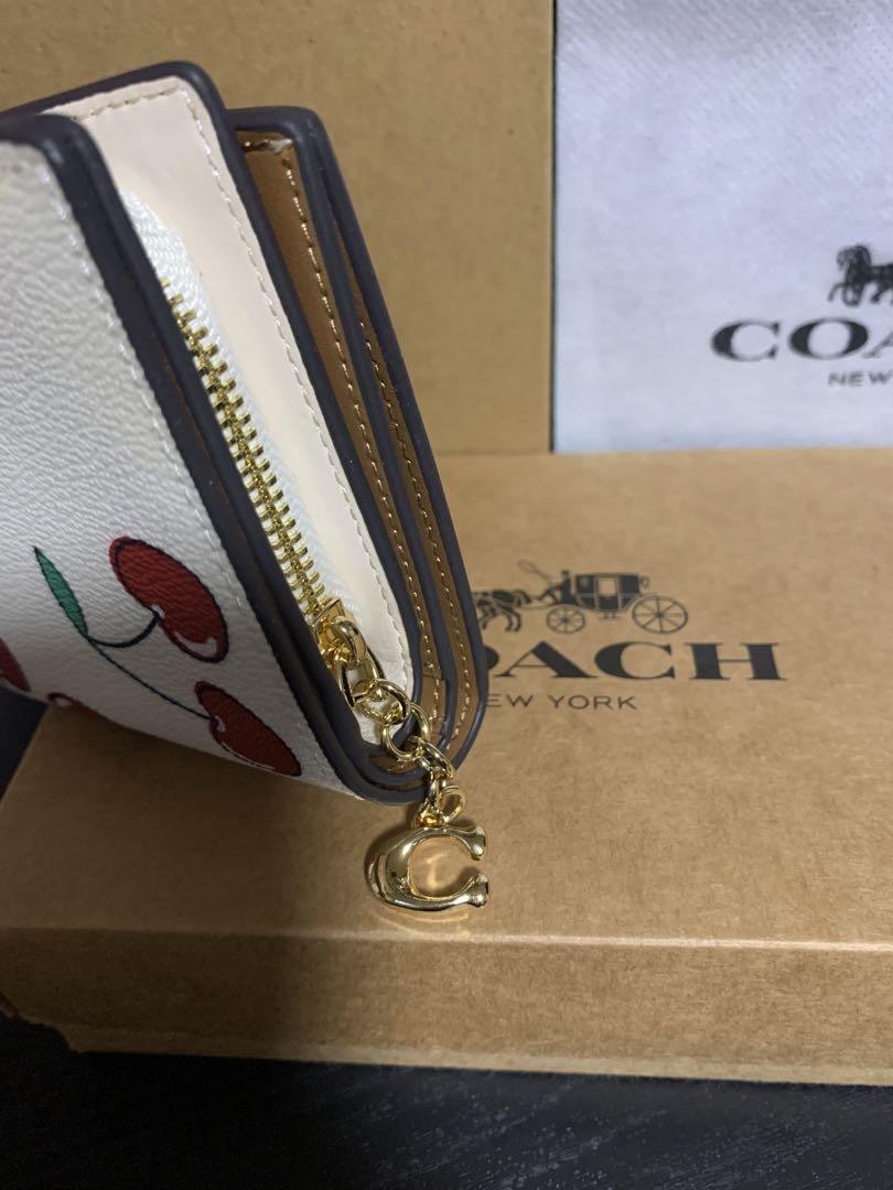 コーチ COACH 二つ折り財布さくらんぼ - メルカリ