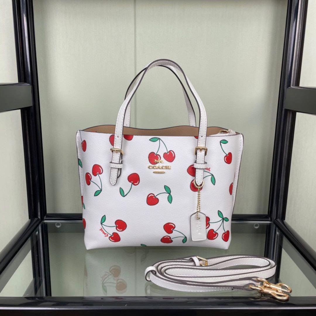 コーチ mollietote チェリー プリントトートバッグ CE627