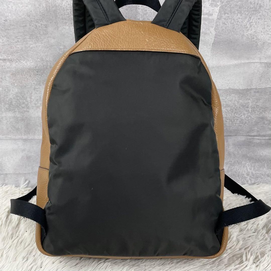 極美品✨ コーチ チャーリーリュックサック ロゴ金具 A4収納