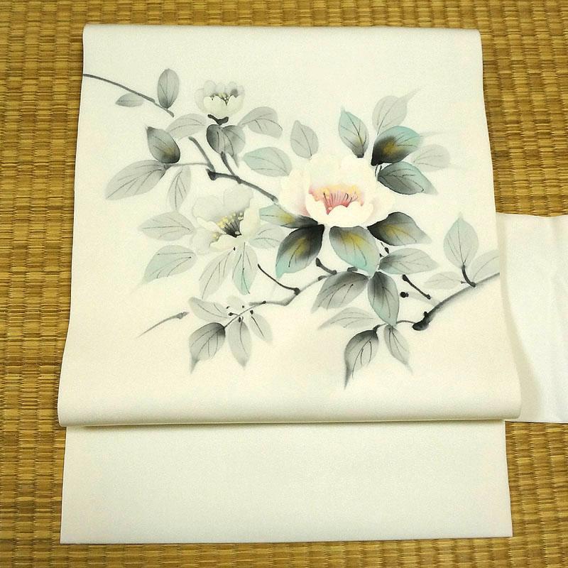 白地に大柄の花と金粉　名古屋帯