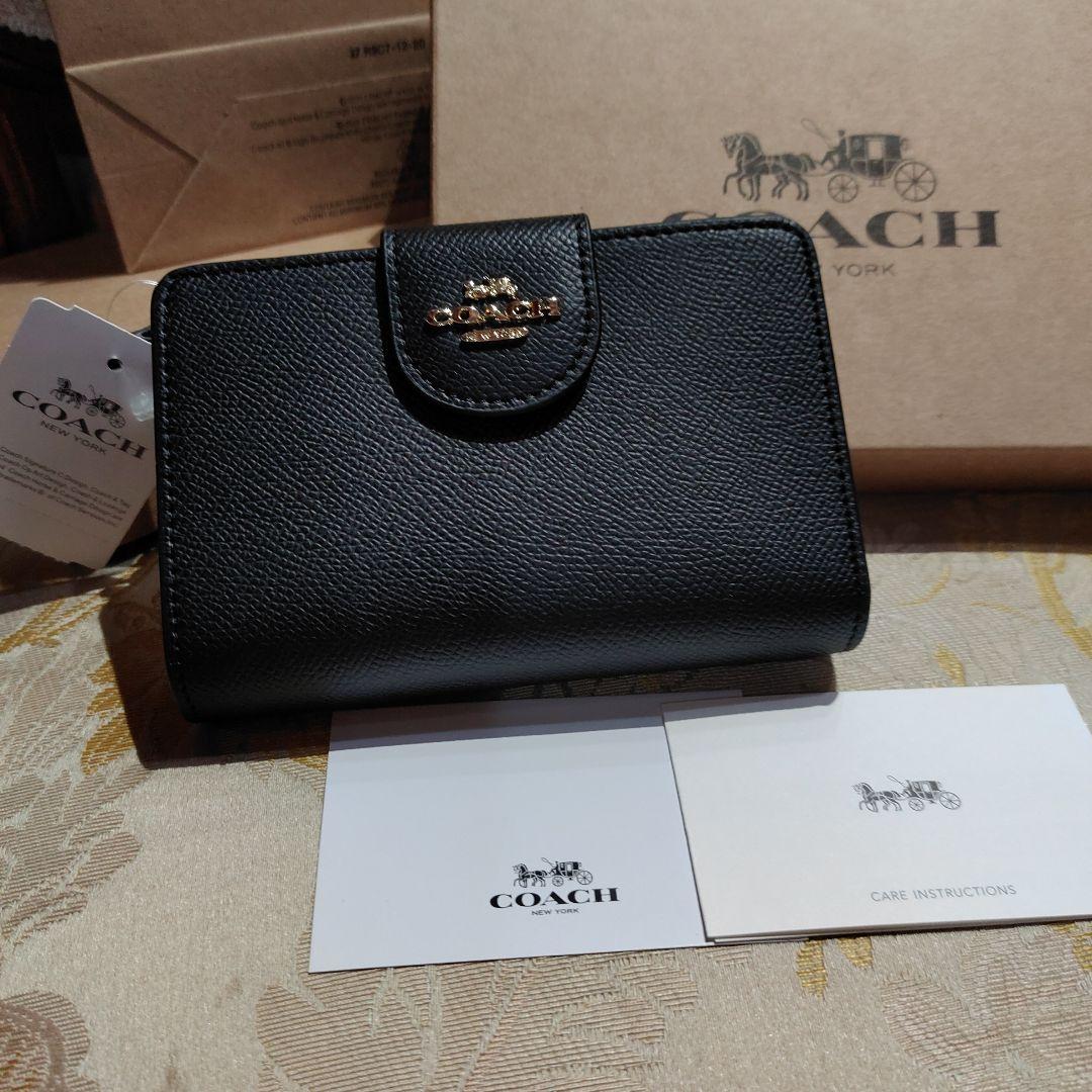 COACHアウトレット ブラック 二つ折り財布 - メルカリ