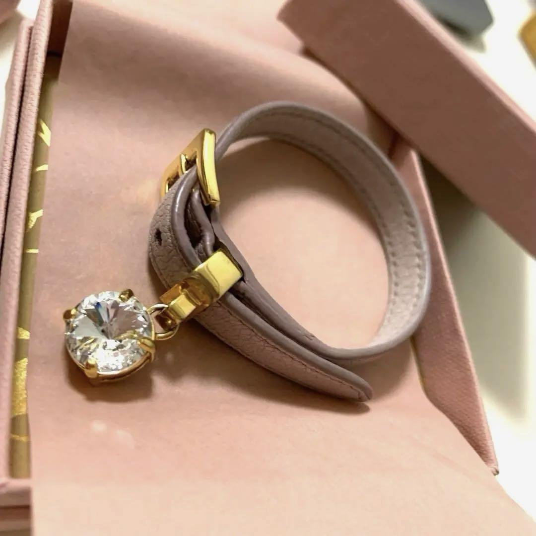 miumiu クリスタル付マドラスレザーブレスレット