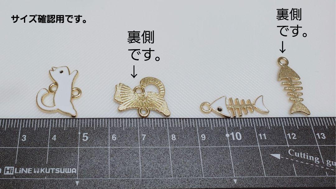 白〉ネコと魚の骨のチャームネックレス - メルカリ 白〉ネコと魚の骨のチャームネックレス - メルカリ