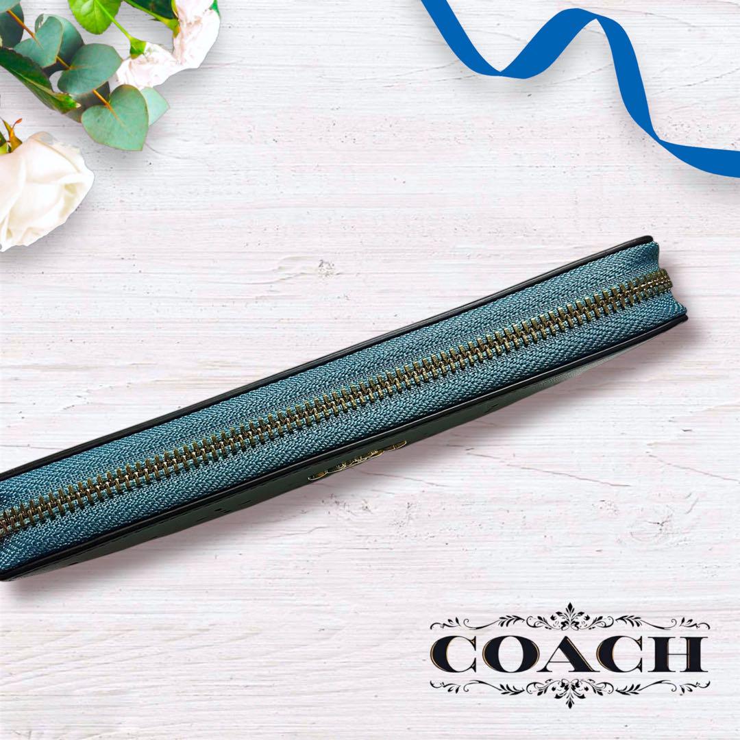COACH パンチング フローラル 長財布 リストレット