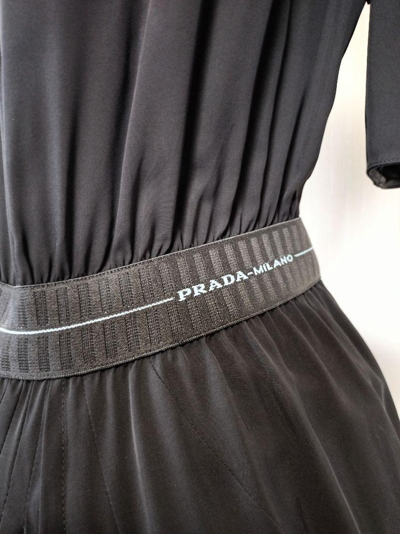 人気満点 ☆PRADAプラダロゴロングドレスワンピースブラック38☆ - メルカリ ワンピース