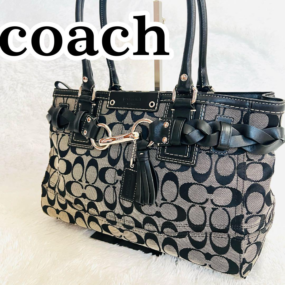 ✨良品✨COACH コーチ　ハンドバッグ　6830 タッセル　シグネチャー 黒 COACH コーチ ハンドバッグ シグネチャータッセル 金具 編込み