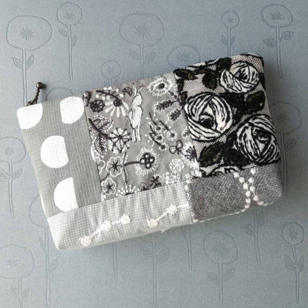 ミナペルホネン 生地使用　celebrate パッチワークブックカバー　B5版 ミナペルホネン 生地使用 パッチワーク がま口ポーチ ハンドメイド