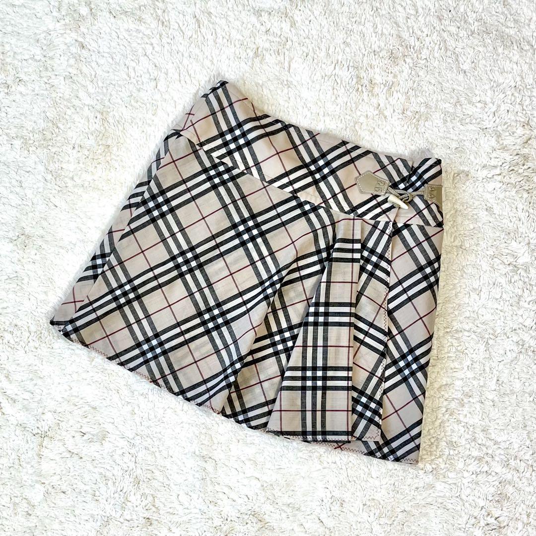 【素敵なデザイン❗️】BURBERRY ノバチェック柄 モノトーン フレアスカート BURBERRY バーバリー ノバチェック ラップフレアスカート - メルカリ