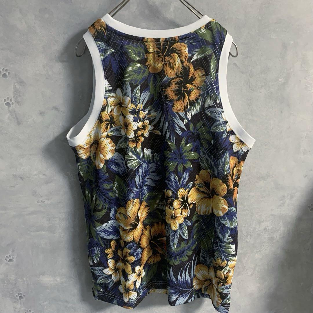海外並行輸入正規品 STUSSYステューシー タンクトップ メッシュ プルメリア柄 花柄 トップス