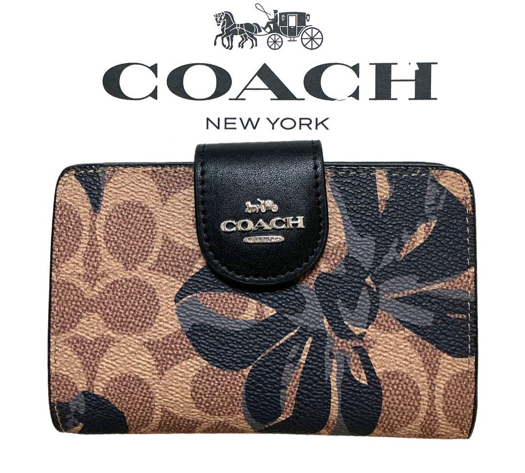 新作コーチCOACH二つ折り財布 シグネチャー リボン柄日本円入ります。