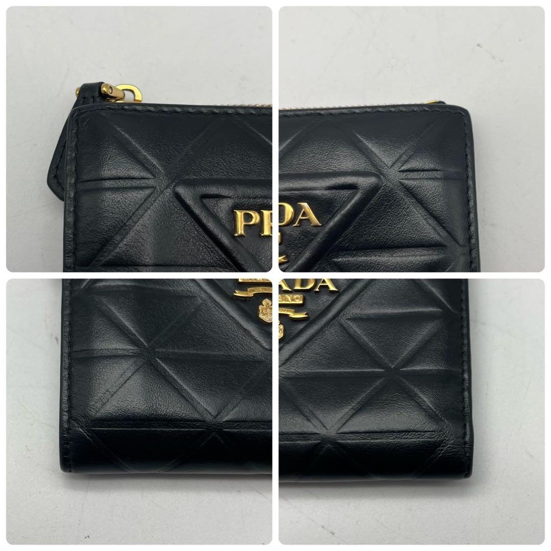 新型 極美品 プラダ トライアングル レザー コンパクト 折り財布 ブラック 新型 極美品 プラダ トライアングル レザー コンパクト 折り財布 ブラック