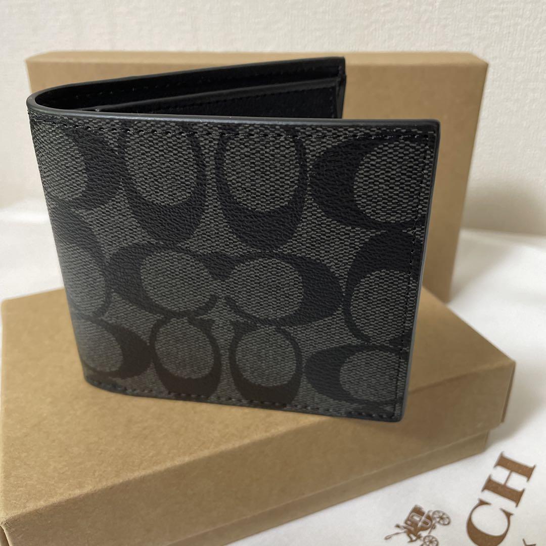 新品未使用コーチCOACHメンズ二つ折り財布 ブラックF75006