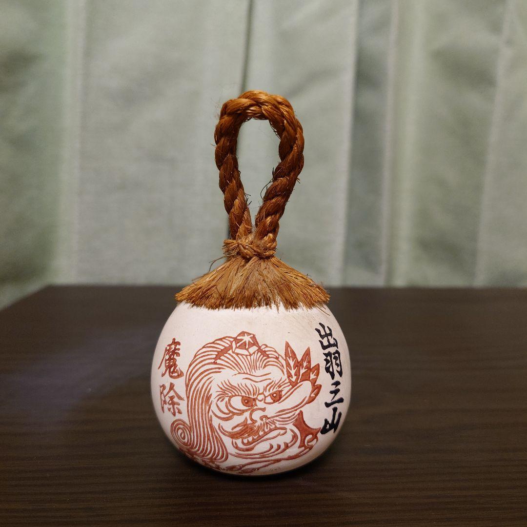 獅子の顔の陶器置物 鈴付き