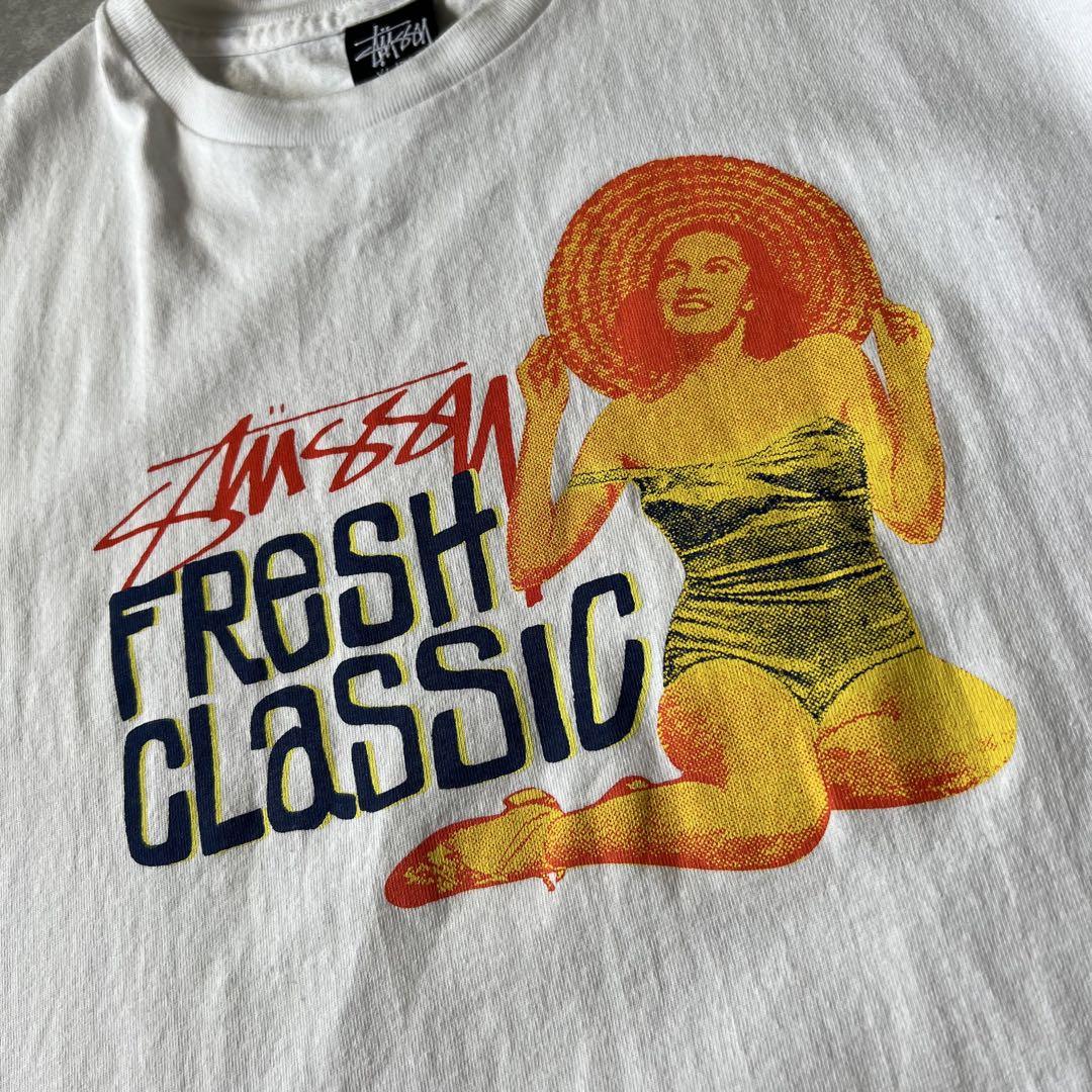 【陽気な美人プリント、センターロゴ】stussy古着Tシャツストリート菅田将暉