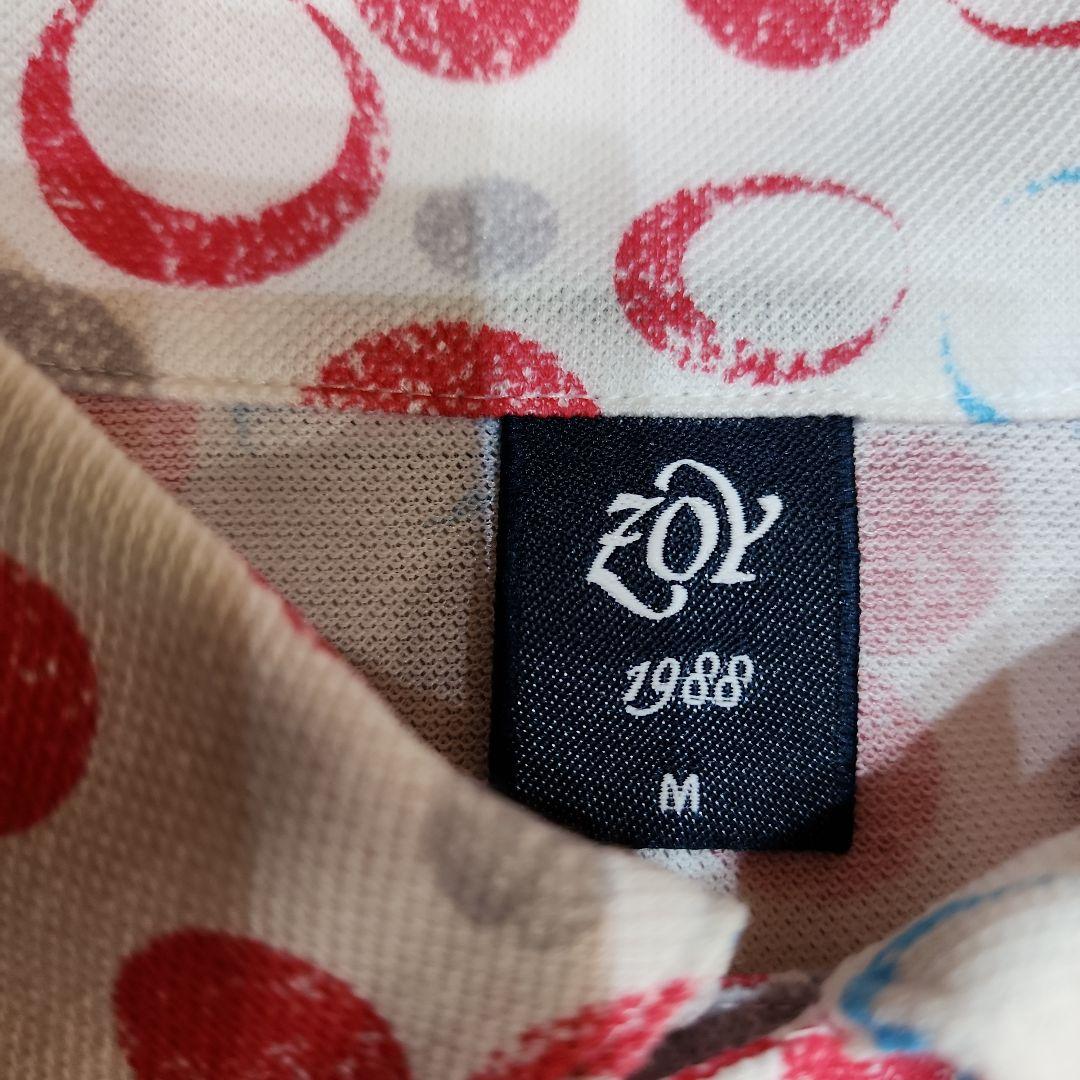 【コンビニ受取対応商品】 新品未使用:ZOY:ゾーイの白地に赤、グレー、水色のポロシャツ メンズウェア