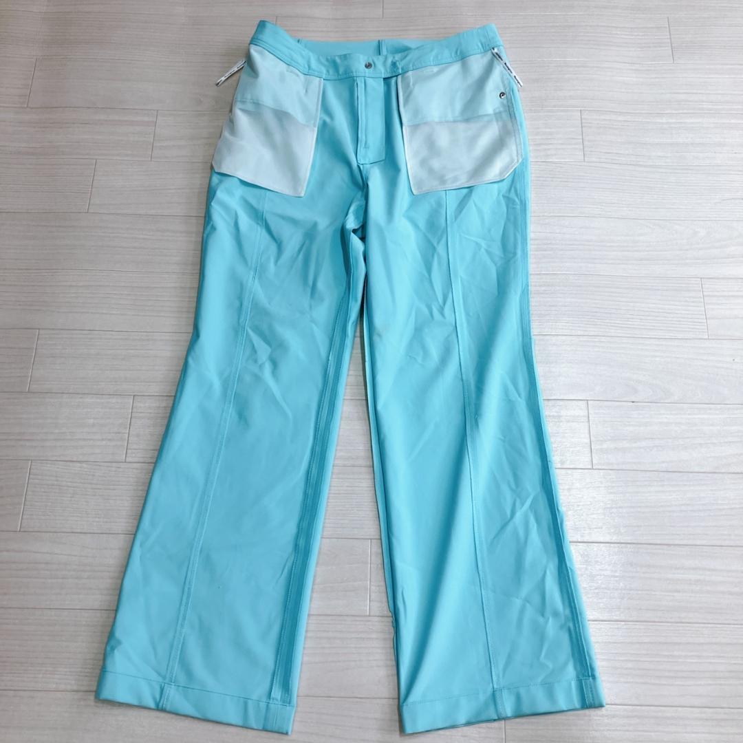 【美品】マンシングウェア グランドスラム ゴルフパンツ 9S ターコイズ