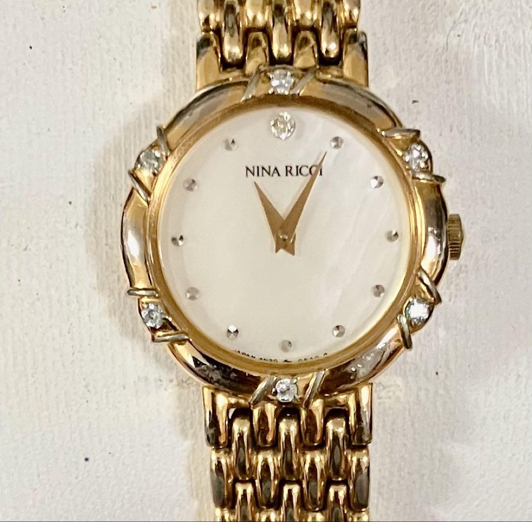 ニナリッチ 腕時計 石付き ☆稼働品☆NINA RICCI ☆QZ☆石付き☆シェル文字盤レディース