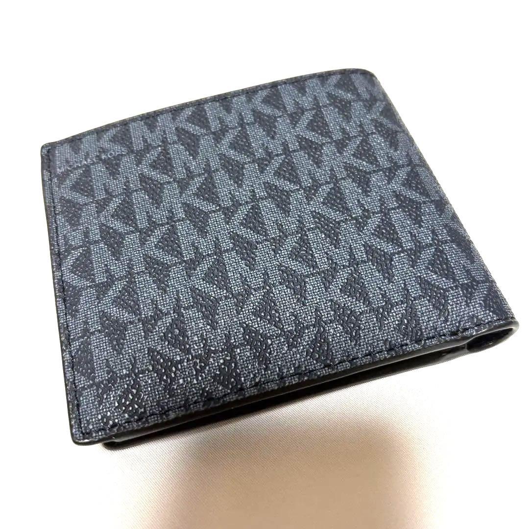 MICHAEL KORS 二つ折り財布 ダークブルー　シグネチャー柄