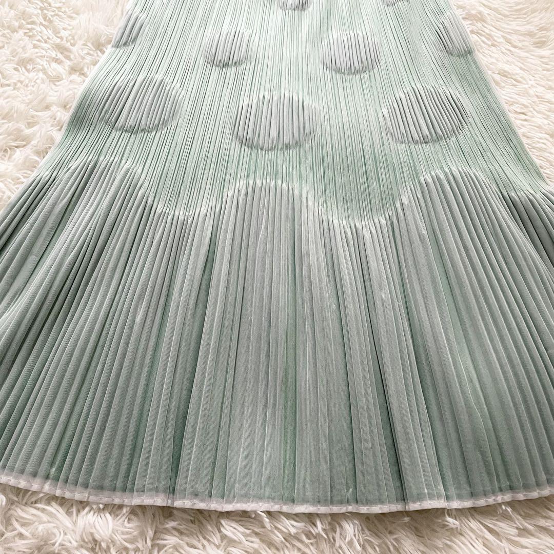 PLEATS PLEASE