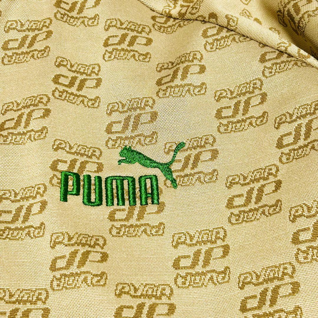 PUMA コアヘリテージ 総柄 トラックジャケット ロゴ刺繍 ベージュ PUMA(プーマ) コアヘリテージ トラックジャケット レディス