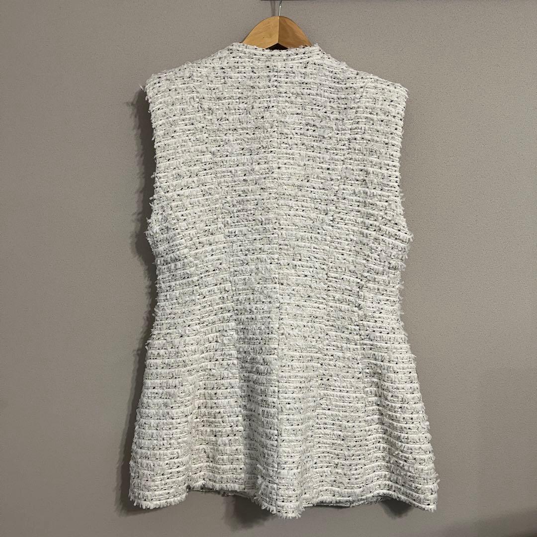 Arpege story ブローチ付ノーカラージレツイードペプラム