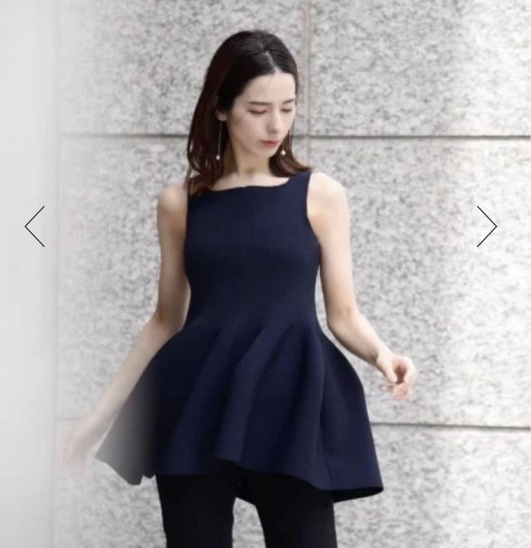 【利益還元祭】開催中！今年最後の大セール 新品タグ付き メルカリ - ペプラムニット knit peplum KARRY カットソー(半袖/袖なし)