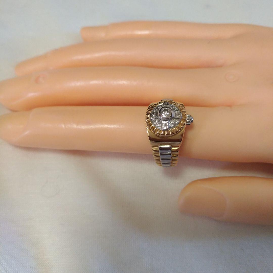 K18、Pt900リング。0.10ct、0.07ct。時計モチーフ指輪。8.2g