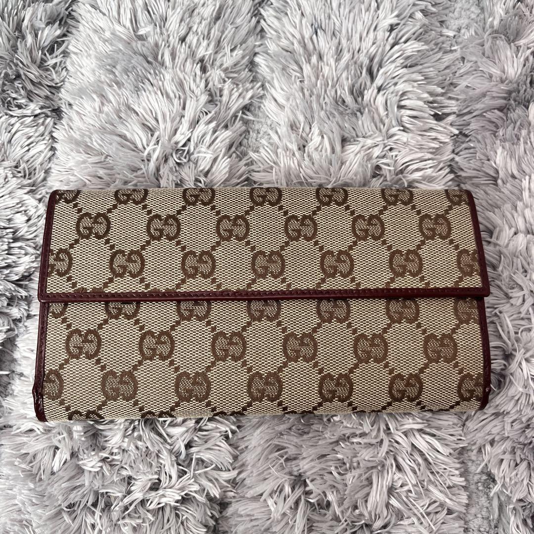 美品✨GUCCI 長財布　ゴールドフラップ　GGキャンバス　ロイヤルレッド