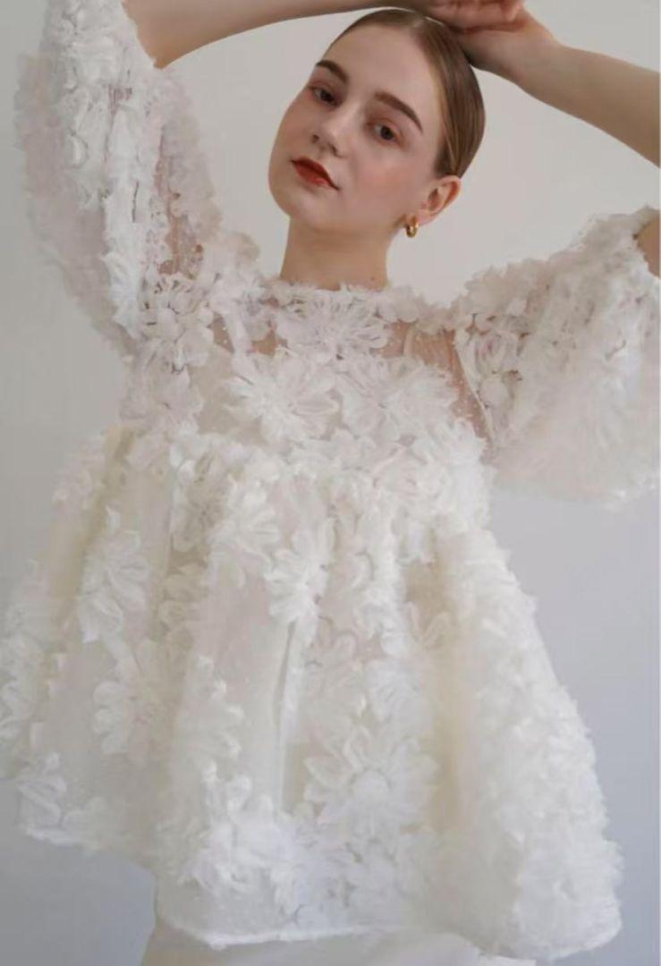 Acka. flower peplum blouse