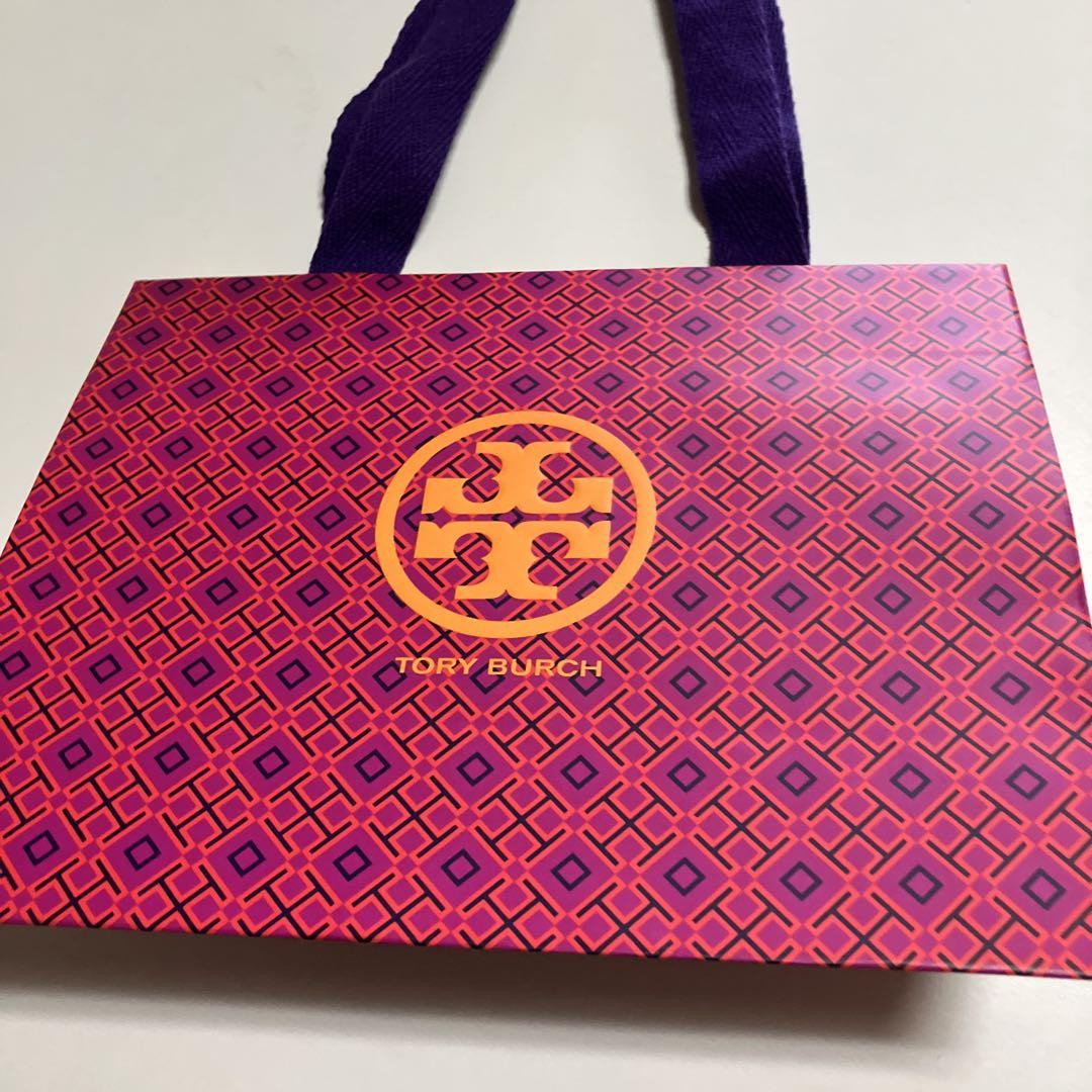 Tory Burch オレンジ×ネイビー ポーチ - メルカリ