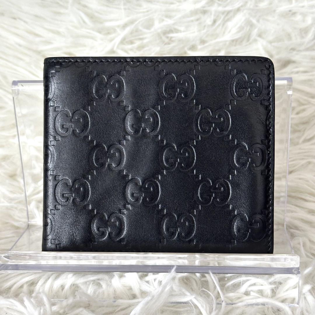 ✨️美品✨️ GUCCI 二つ折り財布 シマ 型押し レザー 黒