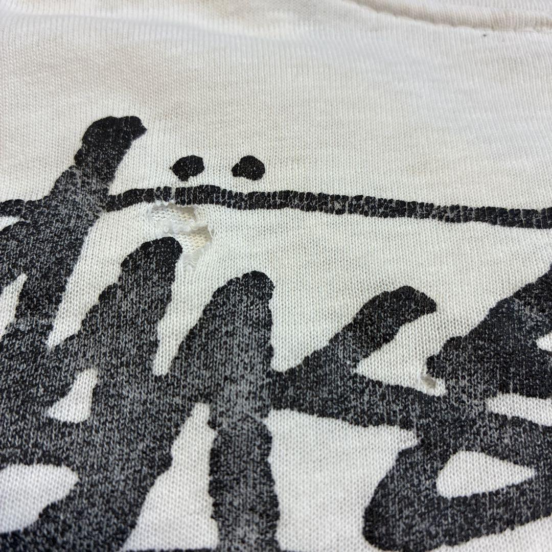 80'sビンテージ古着！アメリカ製 STUSSY 黒タグ ラスタ Tシャツ 襤褸