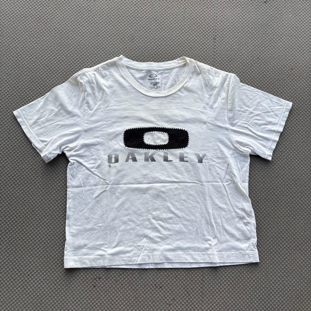 Oakley ロゴ 短丈Tシャツ ホワイト