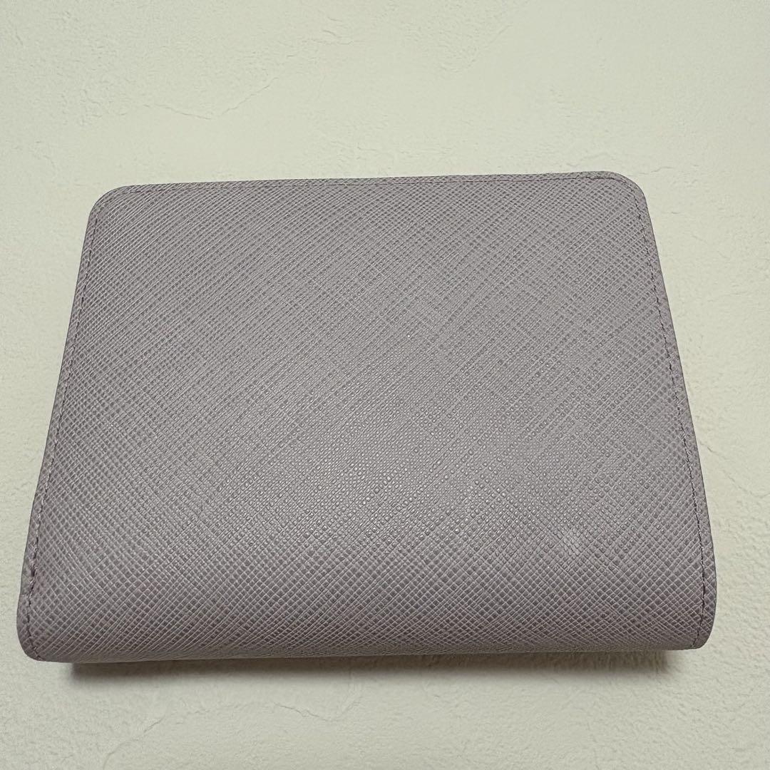 新品 ジルスチュアート 二つ折り財布 パープル がま口