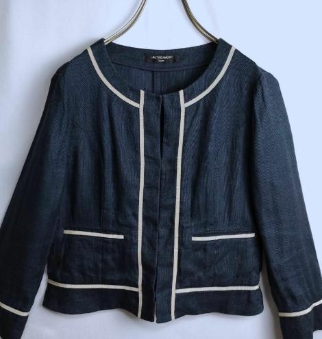黒いジャケット 白い縁取り付き