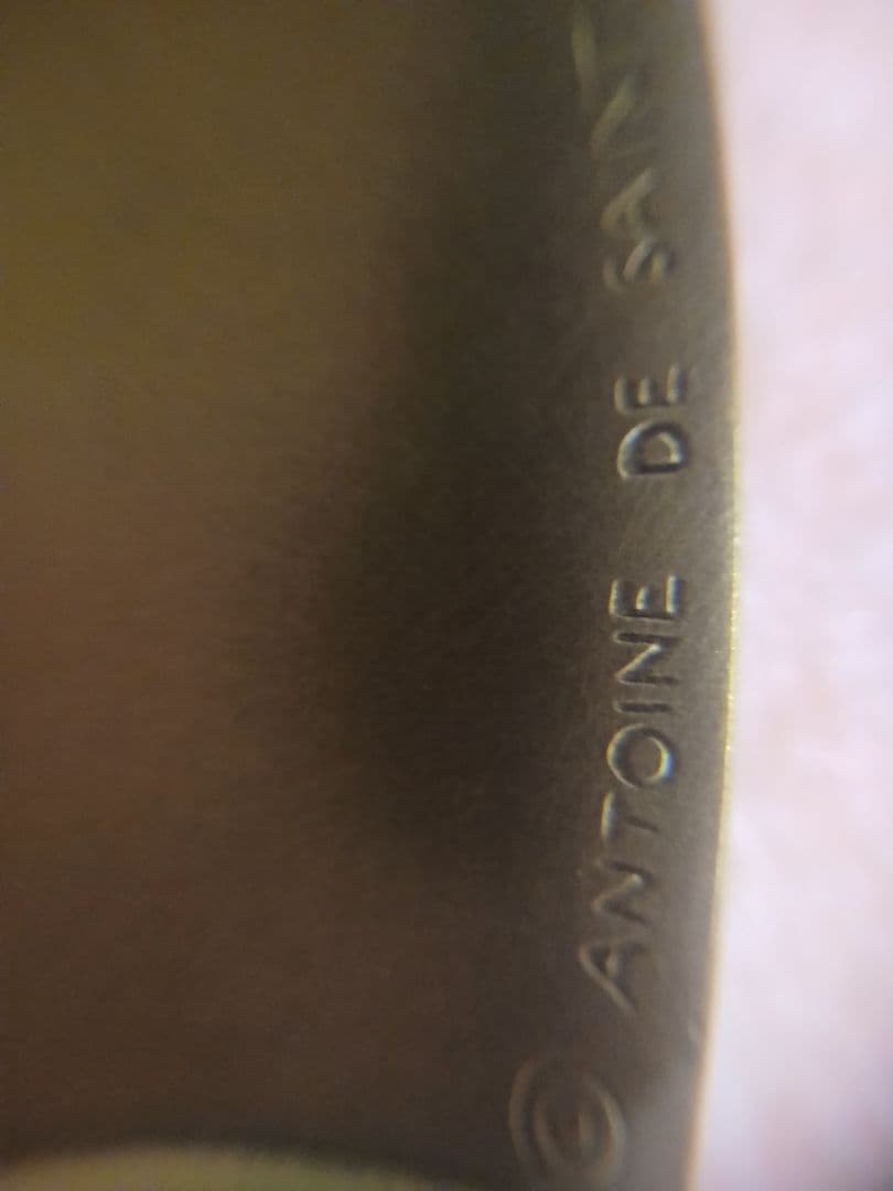 フランス版発行60周年記念コイン