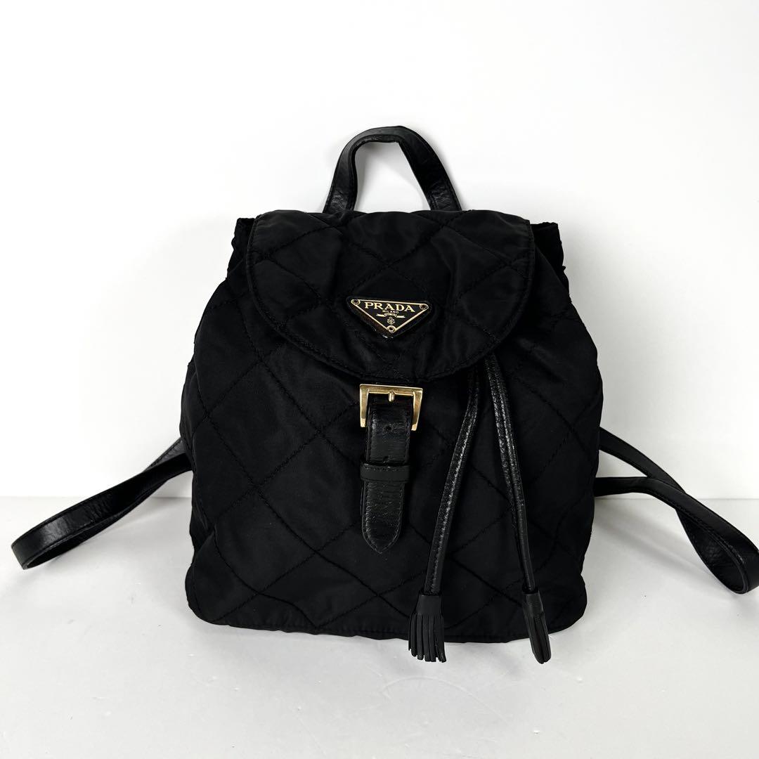 PRADA プラダ　キルティング リュック ゴールド　ナイロン ブラック PRADA プラダ キルティング リュック 巾着 ナイロン レザー