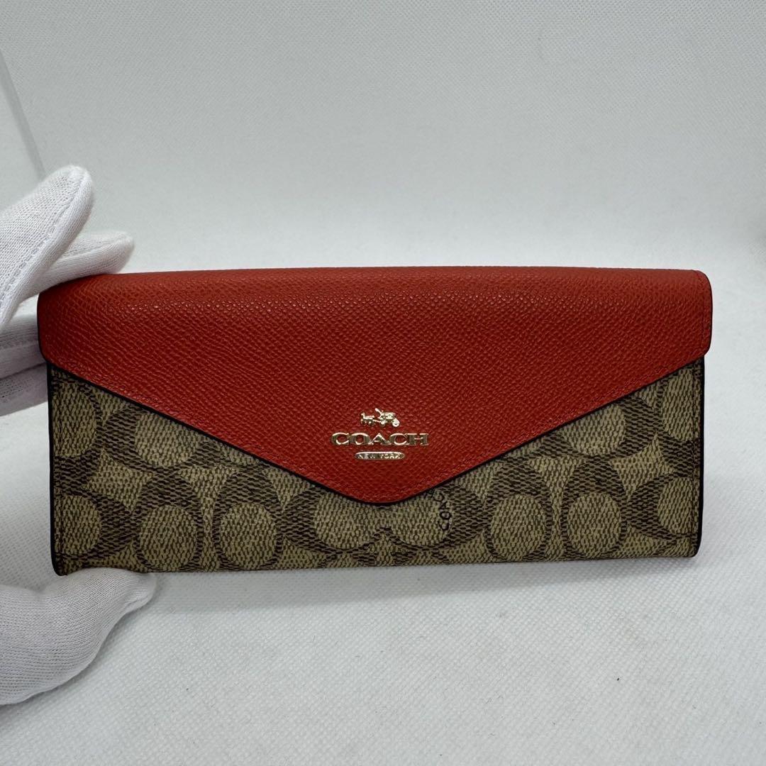 COACH 二つ折り財布 レッド/ベージュ - メルカリ