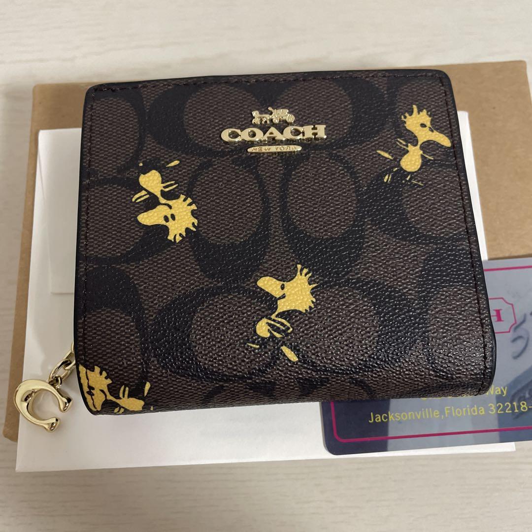 本日限定価格COACH コーチ二つ折り財布ミニ財布シグネチャースヌーピー コラボ coach コーチ シグネチャー スヌーピー コラボ 二つ折り財布