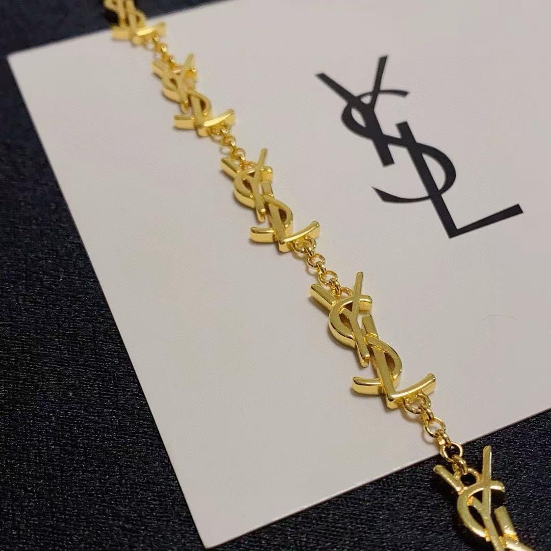 SAINT LAURENT ゴールド ロゴ ブレスレット - メルカリ